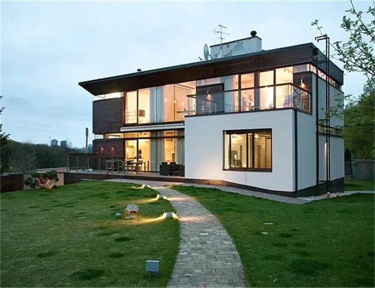 A hotel front with tall glazed openings